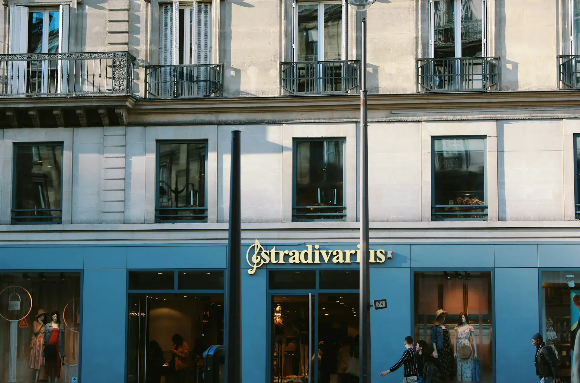 Shopfront of ground-floor commercial premises on a busy Parisian shopping street