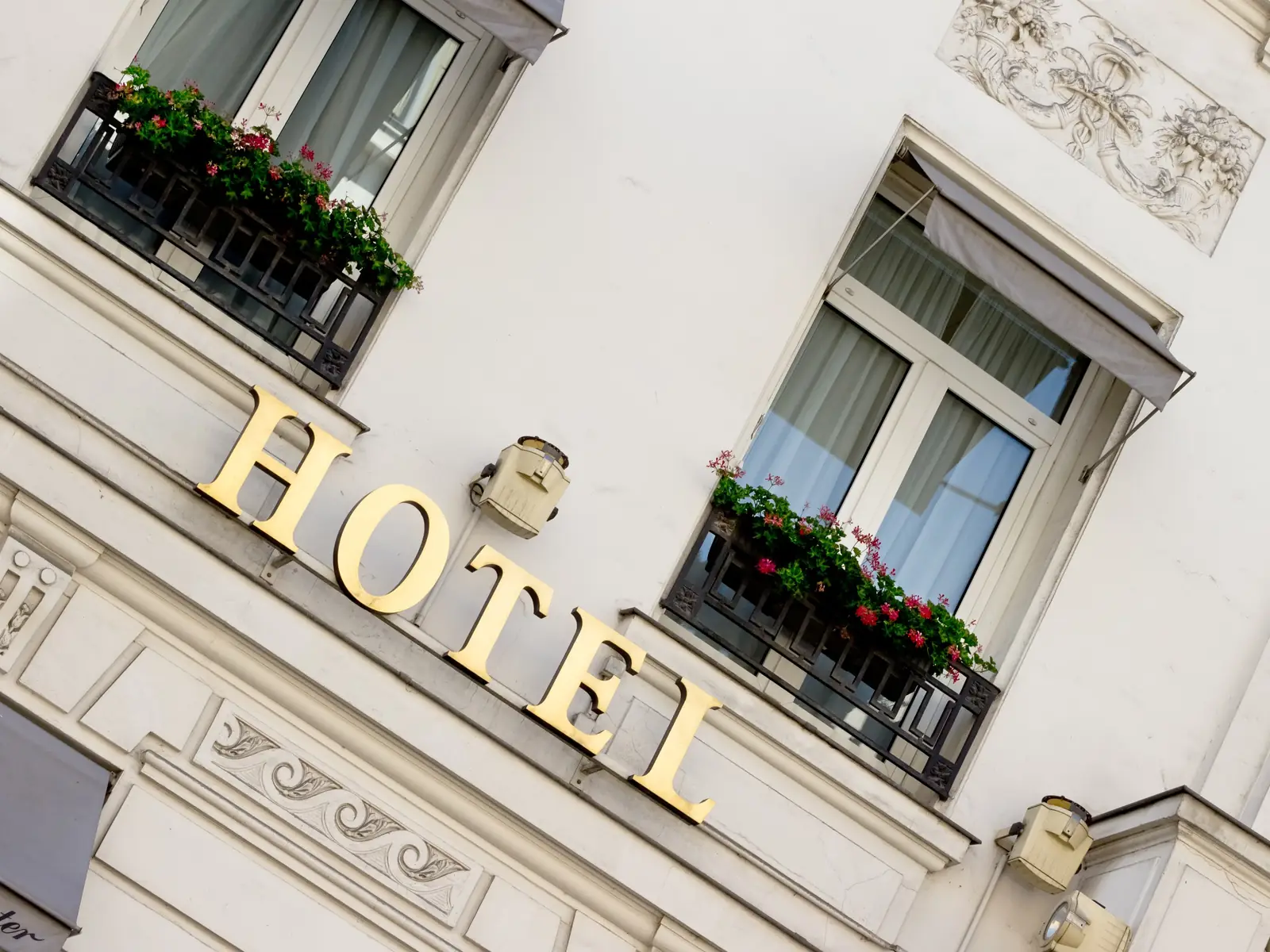 Gilded sign of a Paris hôtel particulier