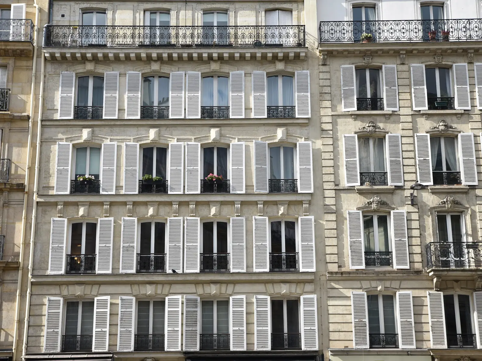 Paris façade with white shutters