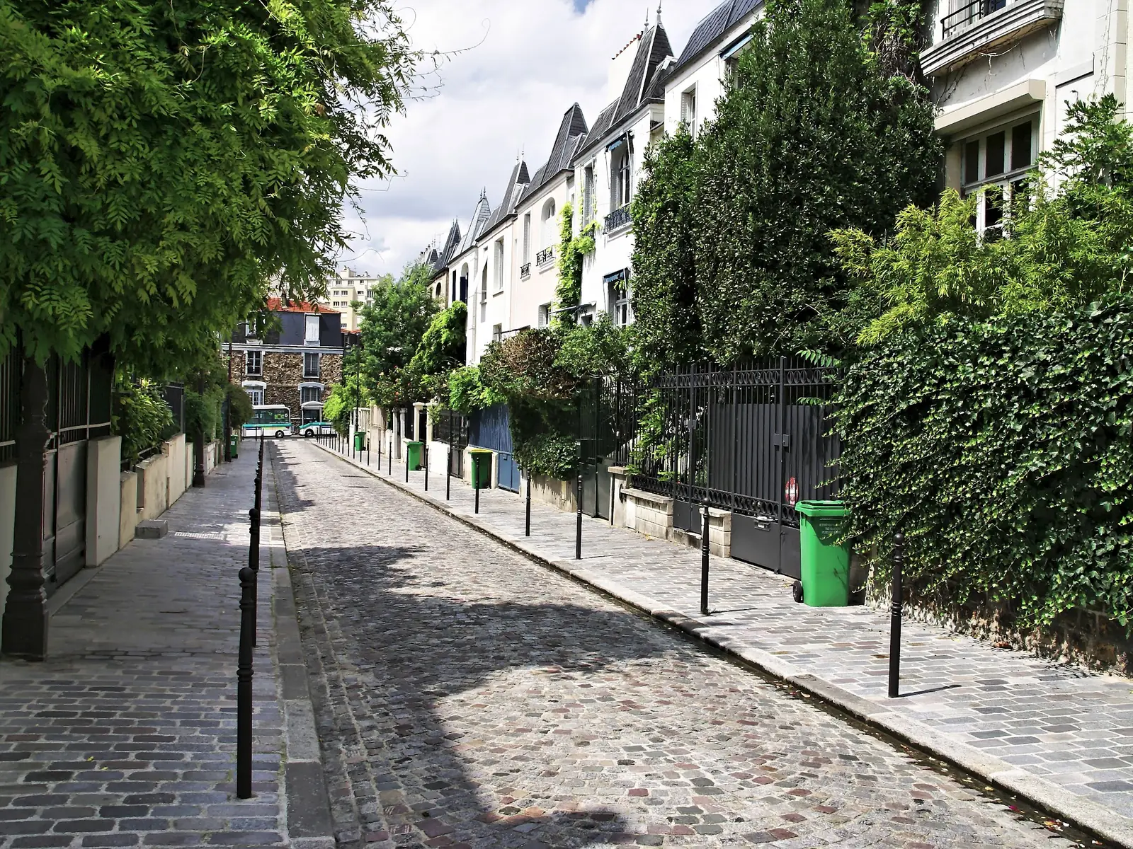 Green cobbled lane in Paris