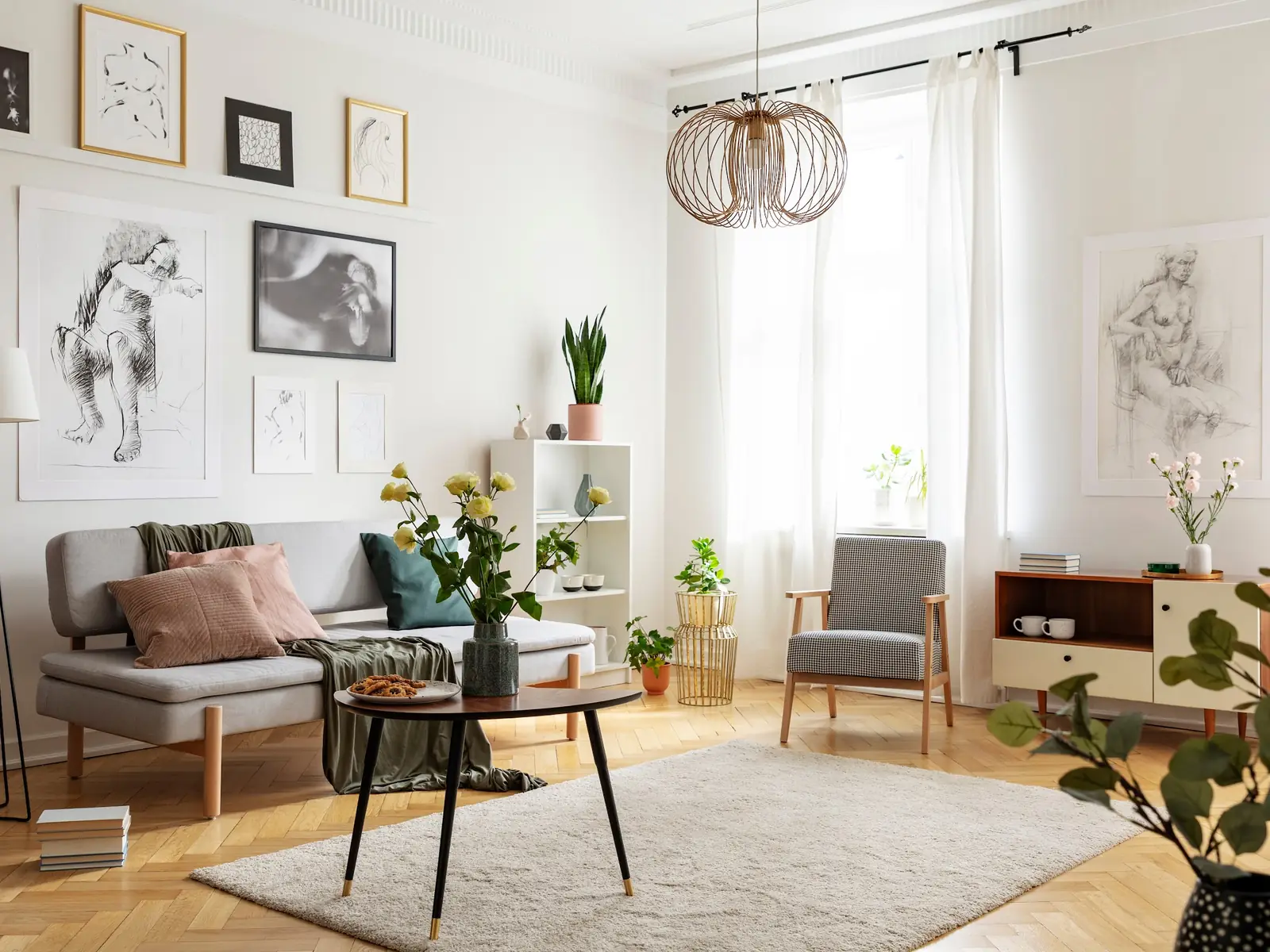 Bright Paris living room with framed prints