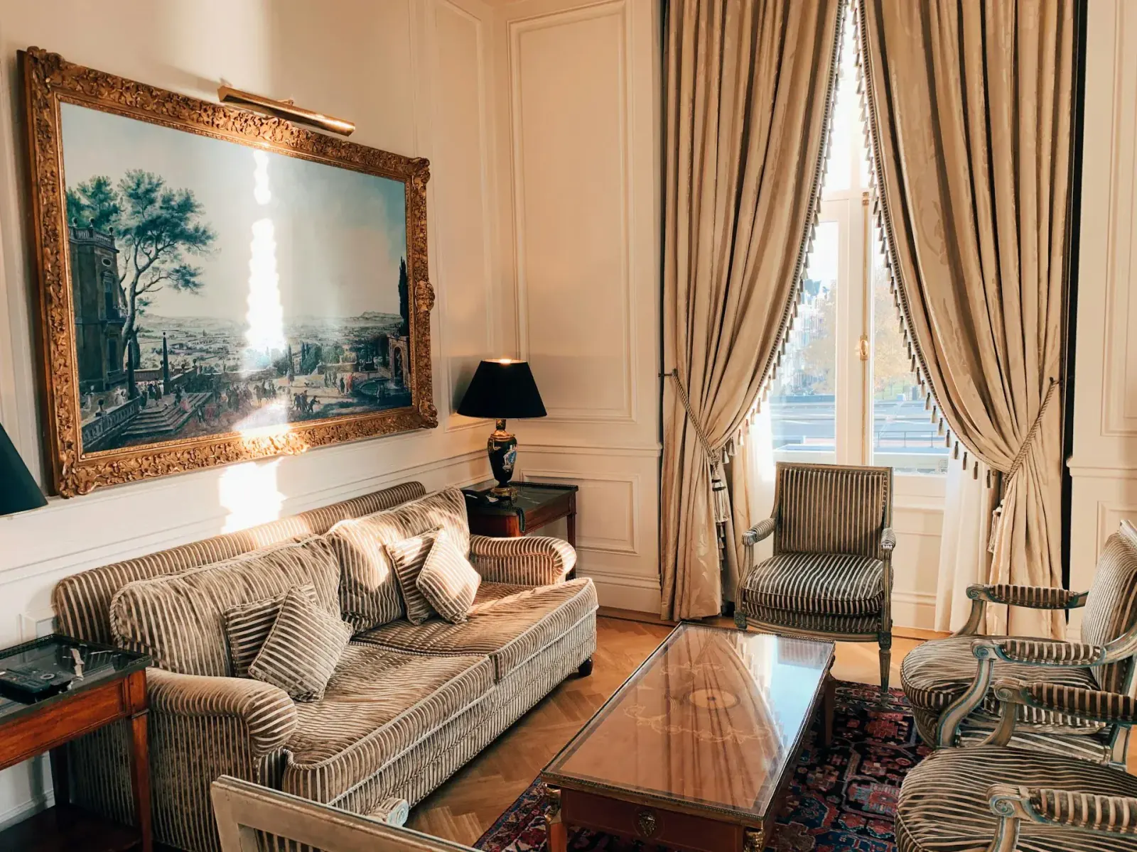 Elegant Parisian living room prepared for a viewing with careful home staging